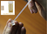 Refraktometer im Honig Wassergehalt messen mit Kalibrierflüssigkeit